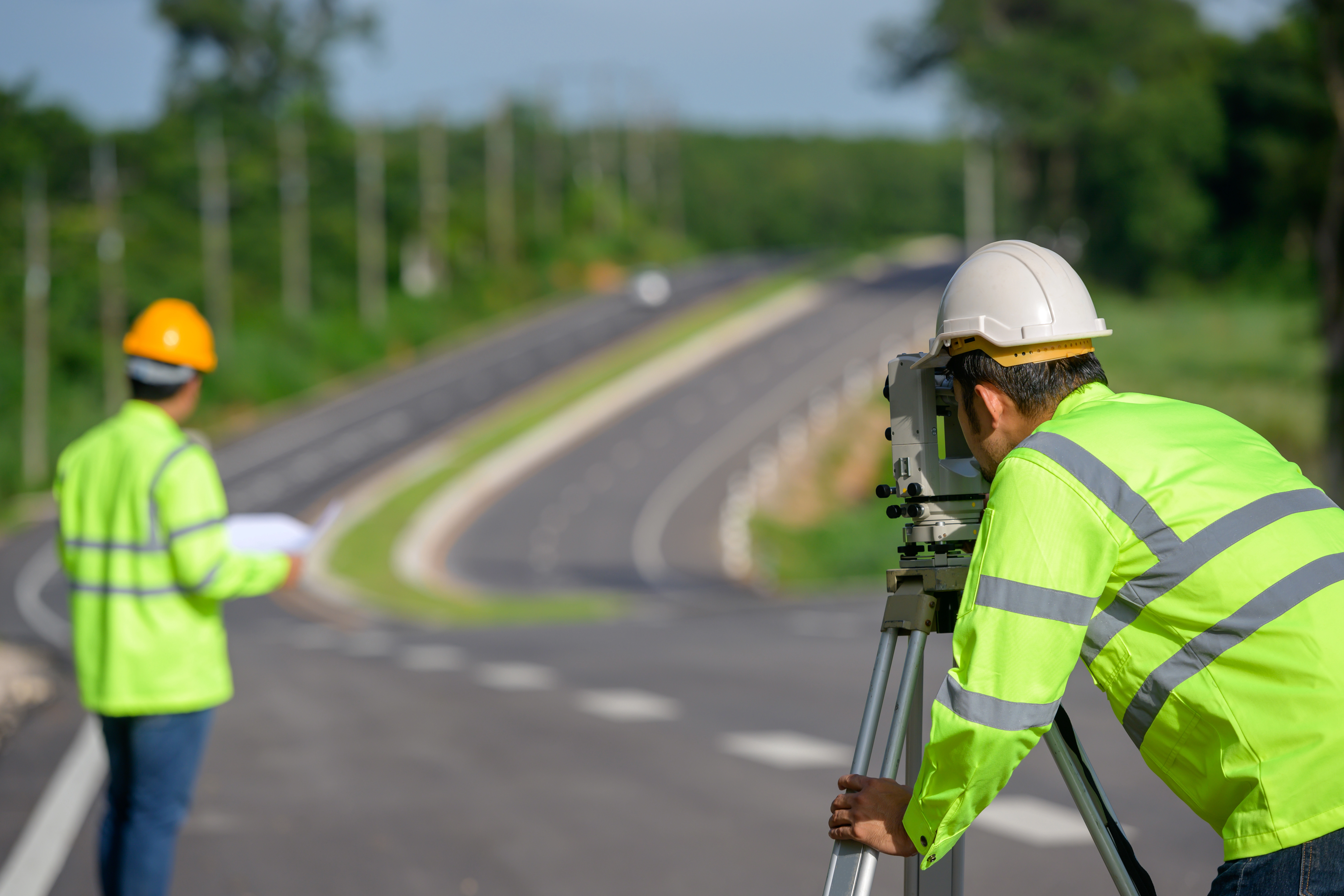 Picture Two Civil Engineers Using Theodolites Measuring Land Coordinates Standing Outdoor Theodolites Road Construction Site