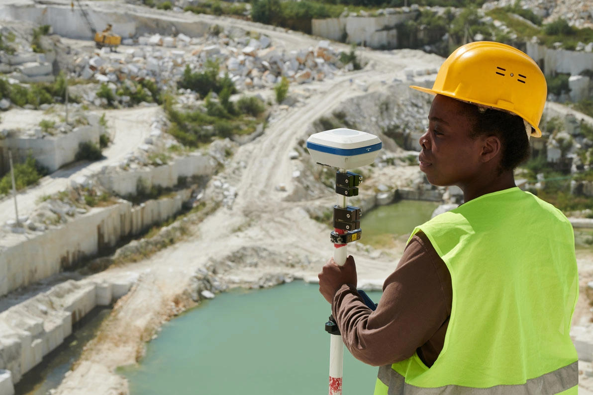 Young Serious African American Female Engineer Surveyor With Theodolite 2