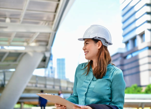 Close Up Engineer Woman Against Built Structure Optimised